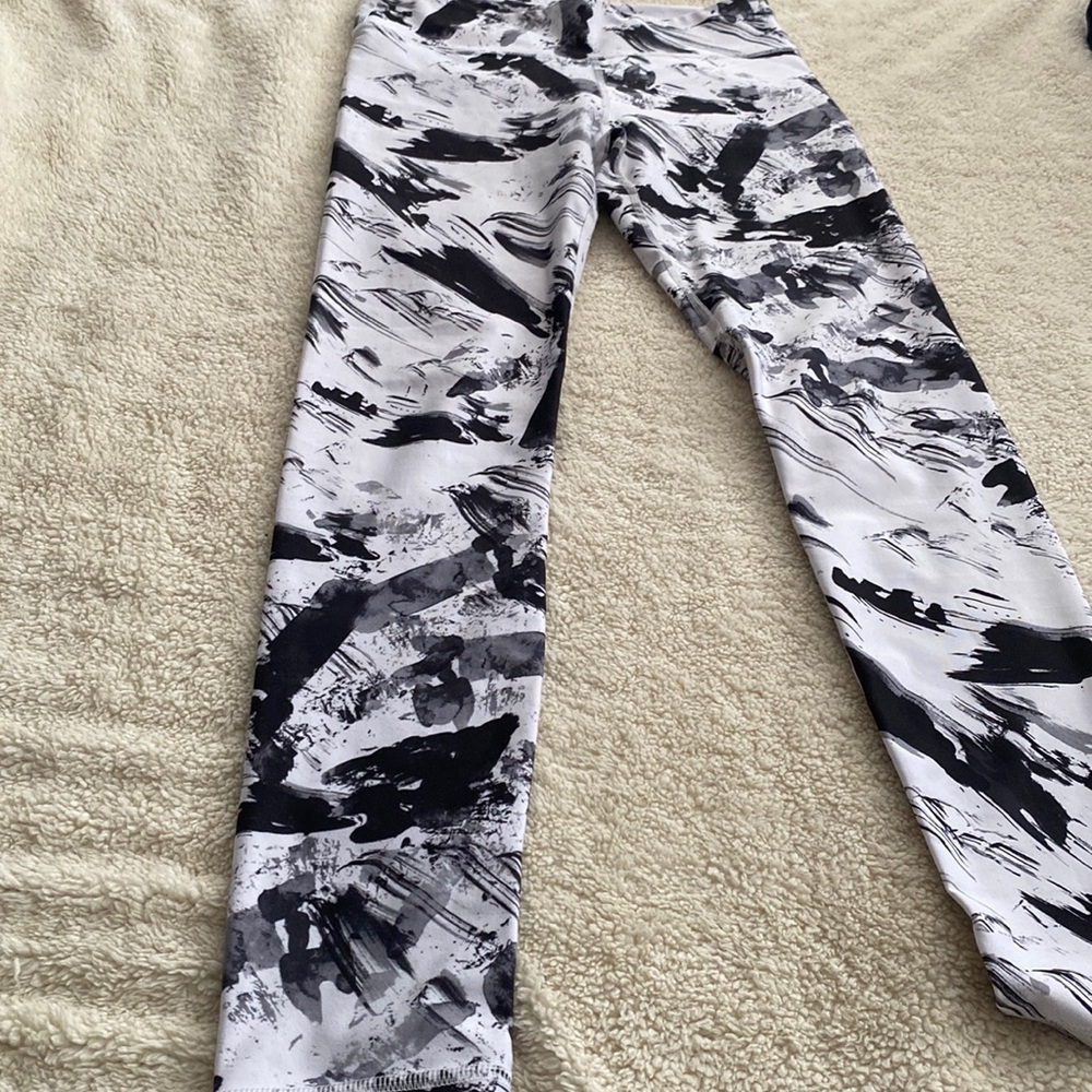 White leggings with black and gray abstract design